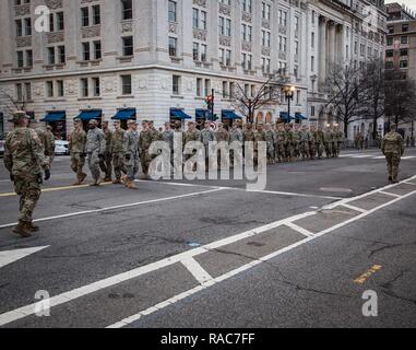 U.S Soldiers assigned to 3rd Infantry Regiment,“The Old Guard,” march down Pennsylvania Avenue during the Department of Defense 58th Presidential Inauguration Dress Rehearsal in Washington, D.C., Jan. 15, 2017. More than 5,000 military members from across all branches of the armed forces of the United States, including Reserve and National Guard components, provided ceremonial support and Defense Support of Civil Authorities during the inaugural period. Stock Photo