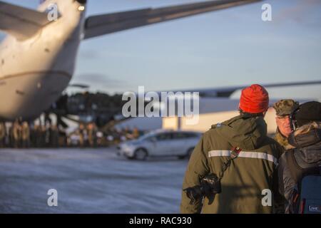 U.S. Marine Corps Col. Doug Bruun, Marine Corps liaison team Officer in Charge in Norway, speaks with local media after Marines with Black Sea Rotational Force 17.1 arrived in Vaernes, Norway, Jan. 16, 2017. A limited contingent of U.S. Marines began rotating in and out of Norway in early 2017 to train with Norwegian military personnel in support of U.S. European Command requirements. Stock Photo