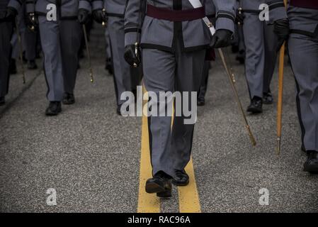 Cadets from West Point U.S. Military Academy march along a practice route on Joint Base Myer-Henderson Hall, Virginia, on Jan. 19 in preparation for the upcoming Presidential Inauguration Parade in Washington, D.C. During rehearsals, U.S. Army Reserve Soldiers practiced with members of the 3rd U.S. Infantry Regiment (The Old Guard), the U.S. Army Field Band, West Point and the D.C. National Guard, which totaled approximately 500 service members and cadets. Stock Photo