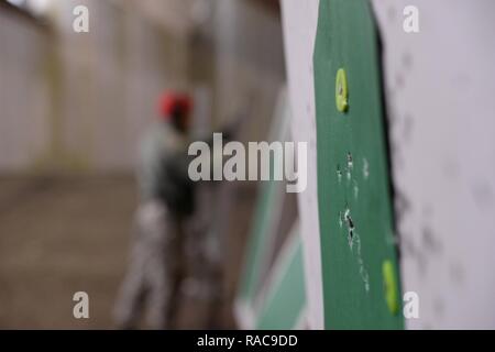 Combat arms instructors with the 569th US Forces Police Squadron score ...