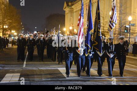 Cadets of the United States Merchant Marine Academy Color Guard march on Pennsylvania Avenue in Washington, D.C., Jan. 20, 2017, after the inauguration of Donald J. Trump as the 45th President of the United States of America. More than 5,000 military members from across all branches of the armed forces of the United States, including Reserve and National Guard components, provided ceremonial support and Defense Support of Civil Authorities during the inaugural period. Stock Photo