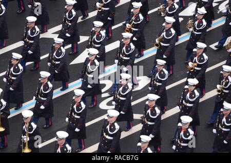 U.S. Marines assigned to the Marine Corps Band, 'The President's Own,' march on Pennsylvania Avenue in Washington, D.C., Jan. 20, 2017, after the inauguration of Donald J. Trump as the 45th President of the United States. More than 5,000 military members from across all branches of the armed forces of the United States, including Reserve and National Guard components, provided ceremonial support and Defensive Support of Civil Authorities during the Inaugural period. Stock Photo