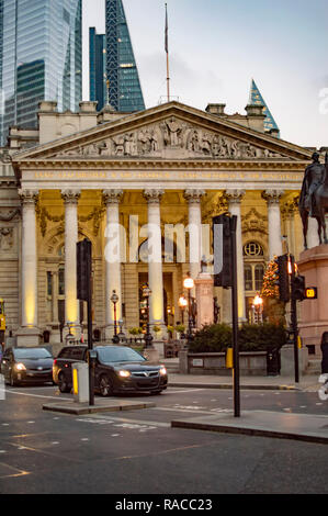 Black taxi cars before royal exchange building in london Stock Photo