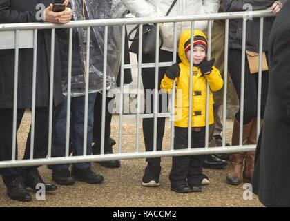 Attendees stand before President Donald Trump arrives to speak during a ...