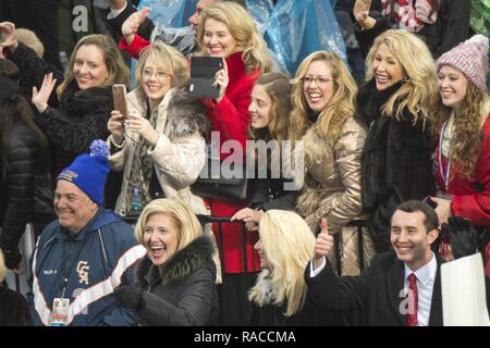Attendees stand before President Donald Trump arrives to speak during a ...