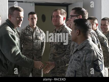 U.S. Air Force Airmen from the 702nd Munitions Support Squadron greet Gen. Tod Wolters, U.S. Air Forces in Europe and Air Forces Africa commander, during a visit to Buechel Air Base, Germany, Jan. 19, 2017. The 702nd MUNSS is a geographically separated unit responsible for receipt, storage, maintenance and control of U.S. war reserve munitions in support of the German air force 33rd Fighter-Bomber Wing. Stock Photo