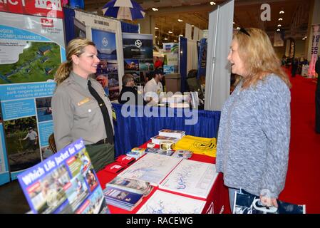 Amber Jones, park ranger at the U.S. Army Corps of Engineers Nashville District’s J. Percy Priest Lake in Nashville, Tenn., talks with an Old Hickory resident during the 31st annual Progressive Nashville Boat & Sportshow at the Nashville Music City Center Jan. 20, 2017. Stock Photo