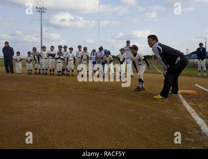 Former Pro Ball Player Coaches Students at Baseball Clinic