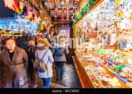 VIENNA, AUSTRIA - DEC 18, 2018 - People shopping at The Christmas market in front of the Rathaus City hall of Vienna, Austria Stock Photo