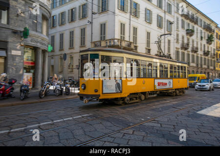 City tram passing on Via Alessandro Manzoni, Milan, Lombardy, Italy, Europe Stock Photo