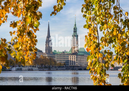 View from the Inner Alster (Binnenalster) to the town hall and St. Nicholas' Church during autumn, Hamburg, Germany, Europe Stock Photo