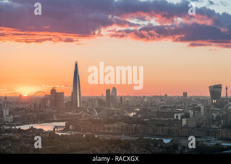 The sun sets over the City of London, London, England, United Kingdom, Europe Stock Photo