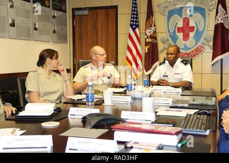 HONOLULU, Hawaii -- (Jan. 25, 2017) Regional Health Command-Pacific Commanding General, Brig. Gen. Bertram Providence, along with other RHC-P and United States Army Pacific key leaders, provided a command briefing and engaged in discussions with United Kingdom Ministry of Defense senior leader, the Director of Medical Policy, Operations and Capability, British Maj. Gen. Martin Bricknell, along with Medical Operations Staff Officer, British Lt. Col. Helen Smyth. The global health engagement also focused on how RHC-P and United Kingdom military medical assets have engaged the Vietnam Ministry of Stock Photo