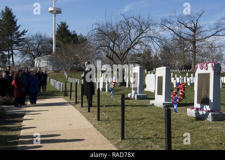 Robert M. Lightfoot Jr., right, acting administrator of NASA, gives remarks at the Space Shuttle Challenger and Space Shuttle Columbia Memorials in Arlington National Cemetery during NASA’s Day of Remembrance, Jan. 31, 2017, in Arlington, Va. NASA says in a statement, “As we do every year at this time, today the entire NASA Family pauses for a Day of Remembrance to reflect on the legacy and memory of our colleagues who have lost their lives advancing the frontiers of exploration.” Stock Photo