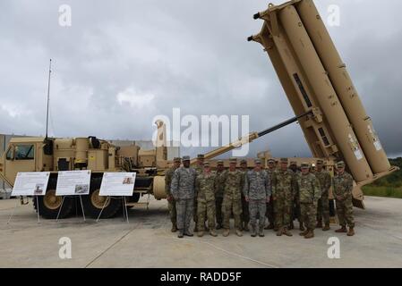 U.S. Air Force Gen. Terrence J. O’Shaughnessy, Pacific Air Forces commander, and Chief Master Sgt. Anthony Johnson, Pacific Air Forces command chief, meet with Soldiers with the 94th Army Air and Missile Defense Command’s Task Force Talon that maintain and operate the Terminal High Altitude Air Defense system Feb. 1, 2017, at Andersen Air Force Base, Guam. The primary purpose of the THAAD system is to defend against missile attacks. The system consists of a launcher, interceptors, fire control and communications equipment, and the AN/TPY-2 tracking radar. Stock Photo