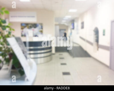 Abstract blured background with business center. Unfocused office place, Blur background, soft lightning. Blurry working place. Bokeh background. Stock Photo
