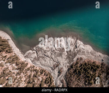 River delta from above with intense colours at the Oeschinensee, Switzerland Stock Photo