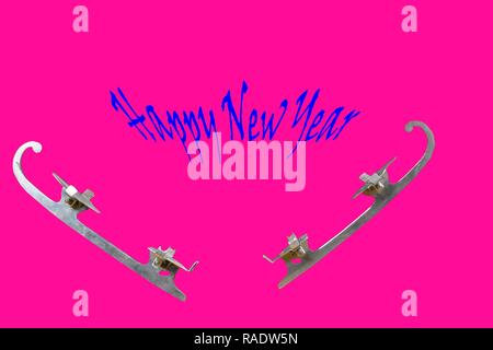 Vintage ice-skate on pink background. Text - Happy New Year. Copy space Stock Photo