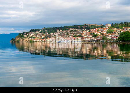 Ohrid old city reflected in Lake Ohrid, UNESCO World Heritage Site, Macedonia, Europe Stock Photo