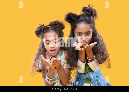 Joyful good looking girls wearing bright makeup Stock Photo