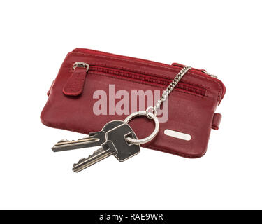 Dark red leather case with two keys isolated on white background Stock Photo