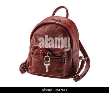 Dark red leather women's backpack with key and wallet isolated on white background Stock Photo