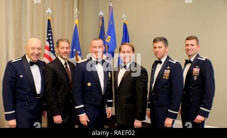 (From left) Retired Col. Jack Anthony, Mike Chesonis, Maj. Gen. Burke E. Wilson, Retired Lt. Col. Erik Eliasen and Col. Toby Doran, all former 1st Space Operations Squadron commanders, pose for a photo with the current commander, Lt. Col. Casey Beard (right), during the 1 SOPS 25th anniversary celebration at The Mining Exchange, in Colorado Springs, Colorado, Friday, Jan. 27, 2017. Stock Photo