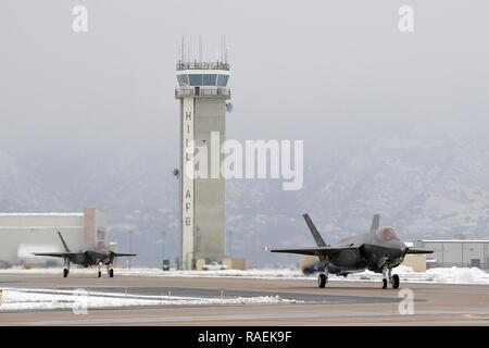 The 421st Fighter Squadron at Hill Air Force Base, Utah, received its first F-35A Lightning II Dec. 12. The squadron is the last of three squadrons in Hill’s 388th Fighter Wing to take possession of combat-ready aircraft, bringing the 388th Fighter Wing closer to full strength. Lt. Col. Richard Orzachowski, 421st FS commander and 1st Lt. Ryan Allen, the squadron's youngest wingman, flew the jets from the Lockheed Martin plant in Fort Worth, Texas into a snow-covered Hill AFB. The arrival of the first jets in the 421st brings the total number of F-35As at Hill to 52 and is a big step toward the Stock Photo