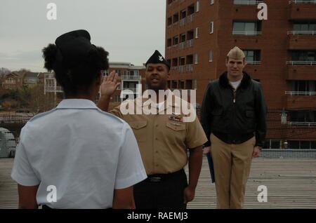 The Hampton Roads Naval Museum proudly hosted a re-enlistment aboard the USS Wisconsin (BB 64). ABE2(AW/SW) George Shaw, from the USS Gerald R. Ford (CVN 78) re-enlisted today in front of members of his command and family. Administering the Oath of Re-enlistment was his daughter, A’niylah Watson, who is enrolled in the Sea Cadet Program at the Academy of Internationl Studies at Rosemont; which is a middle school within the Norfolk Public Schools System. The museum hosts military ceremonies for area commands free of charge aboard the USS Wisconsin (BB 64) and their gallery. Stock Photo