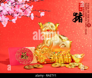 2019 is year of the pig,Golden piggy bank with red background,calligraphy translation: good bless for saving and wealth. Chinese Language on envelop m Stock Photo