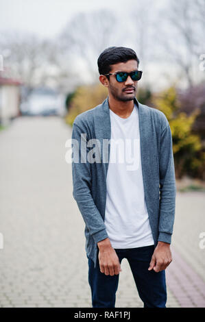 Modern Fashion Young Asian Guy Posing Stylish Grey Jacket Pants Stock Photo  by ©vova130555@gmail.com 650155508