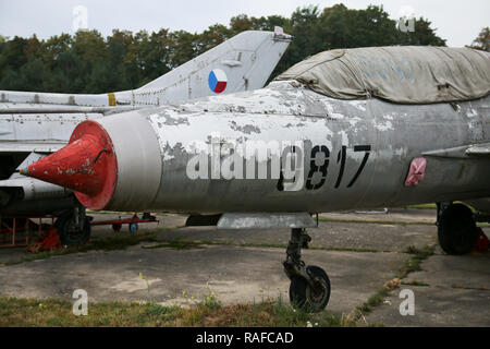 A picture from the abandoned military base full of old rusty fighter jets from the soviet era. Stock Photo