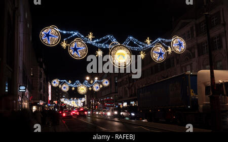 Christmas street decorations, The Strand, Central London, England, UK. Stock Photo