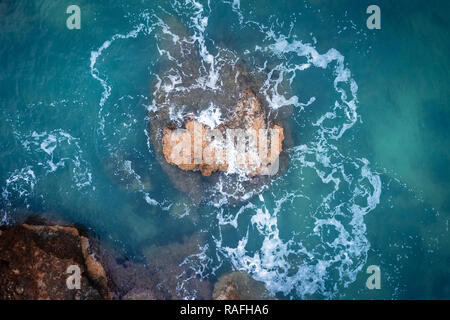 Aerial image of the sea at winter, rocky coast, birds eye view. Beautiful images taken with a drone. Stock Photo