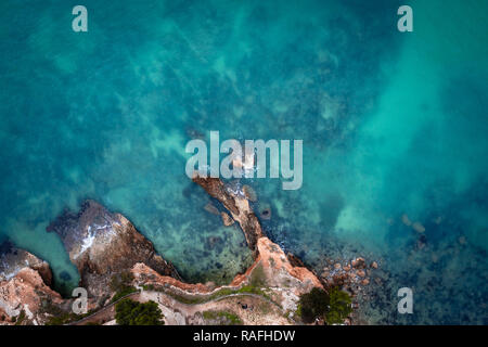 Aerial image of the sea at winter, rocky coast, birds eye view. Beautiful images taken with a drone. Stock Photo