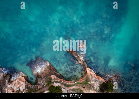 Aerial image of the sea at winter, rocky coast, birds eye view. Beautiful images taken with a drone. Stock Photo