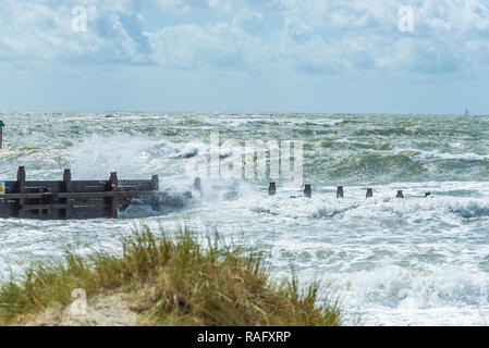 Rough seas and waves at high tide on West Wittering Beach, West Wittering, Nr Chichester, West Sussex, UK Stock Photo