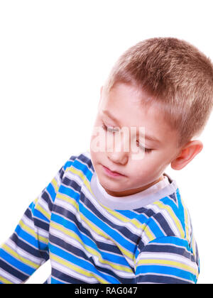 Emotions and thinking calm daydream. Little boy absorbed calm and pensive alone. Stock Photo