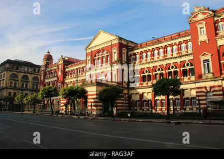 YANGON, MYANMAR - DECEMBER 03, 2016: Colonial style courthouse in the old part of Yangon city, Myanmar (Burma) Stock Photo