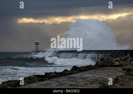 Big sea wave splash at dusk. Douro river mouth, north of Portugal. Stock Photo