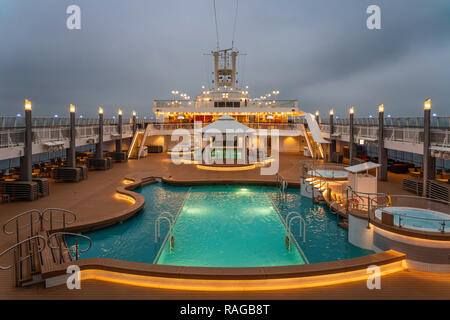 The pool deck of the Norwegian Jade cruise ship at night. Stock Photo