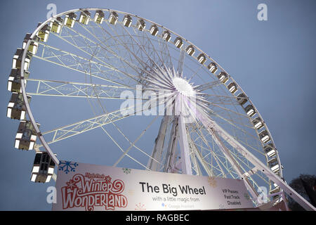 London, United Kingdom - December 30th 2018: Ferris wheel in the evening at Winter Wonderland / Hyde park
