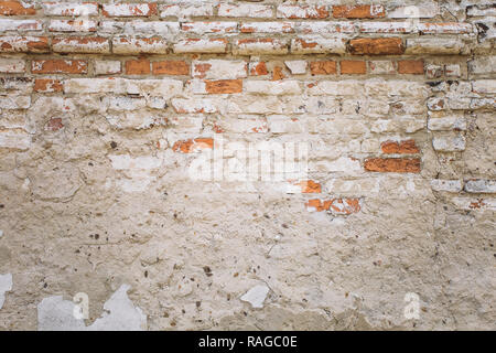 Old weathered brick wall background. Horizontal color photography. Stock Photo