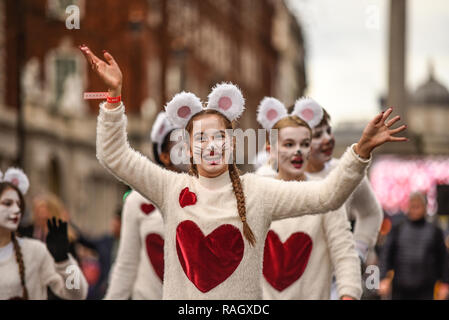 London Borough of Barnet Everything Stops for Tea mice costumes females at London's New Year's Day Parade, UK. Stock Photo