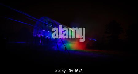 Futuristic abstract rainbow glowing colorful photon tunnel made from DMX lights Stock Photo