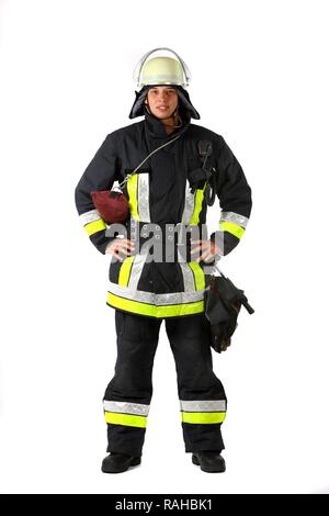 Firefighter with basic equipment, protective clothing made of Nomex, a ...