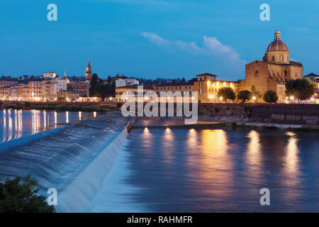 Florence, Italy - August 7, 2018: Santa Rosa weir on Arno river against cityscape of Florence. The weir stabilizes the river banks and enriches water  Stock Photo