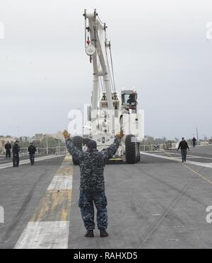 A carrier air crash crane (CVCC), nicknamed Tilly, is positioned on the ...