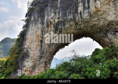 Moon hill, the famous karst hill in Yangshuo county in Guangxi autonomous region in China. Stock Photo
