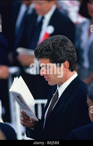 John F Kennedyk Jr. at a  memorial service for Robert Kennedy at Arlington Cemetary in June 1993. Photo by Dennis Brack Stock Photo
